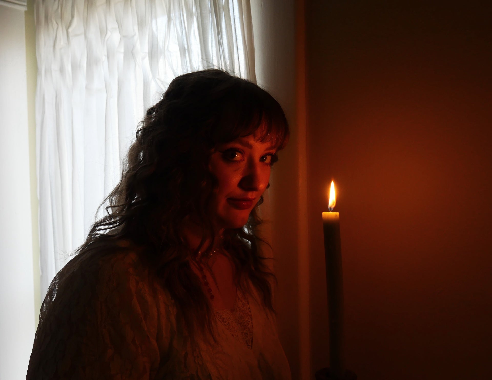 Finn O'Sullivan by candlelight
